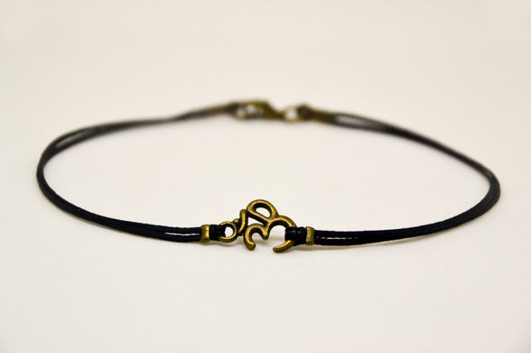 Men's anklet with a bronze Ohm - shani-adi-jewerly