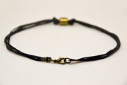 Men's anklet with a bronze tube charm and a black cord - shani-adi-jewerly
