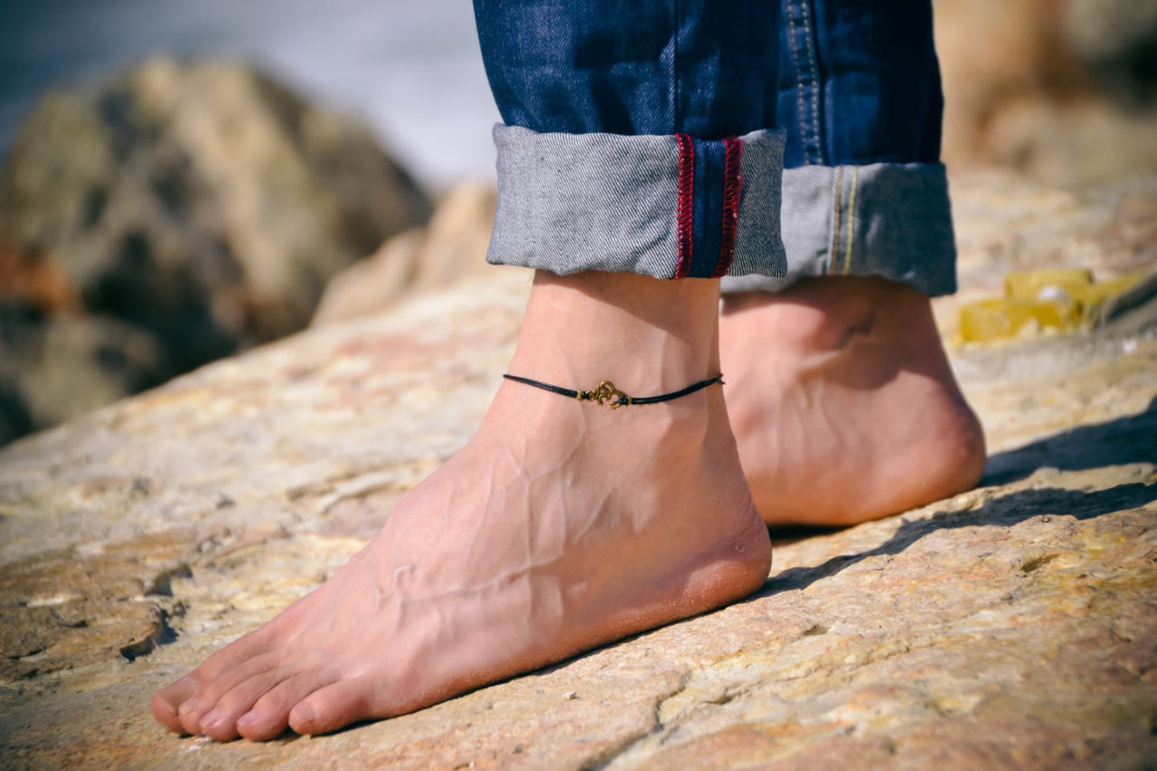 Men's anklet with a bronze Ohm - shani-adi-jewerly