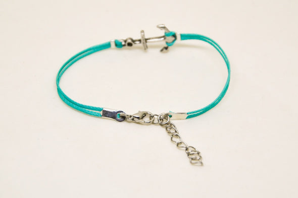 Turquoise cord bracelet with a silver plated anchor charm - shani-adi-jewerly