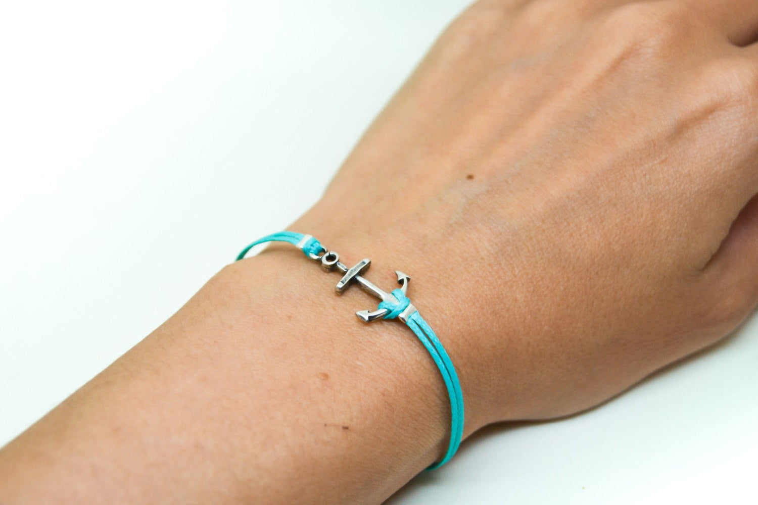 Turquoise cord bracelet with a silver plated anchor charm - shani-adi-jewerly