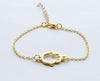 Gold chain bracelet with gold Hamsa charm - shani-adi-jewerly