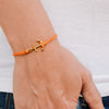 Gold anchor bracelet, orange string - shani-adi-jewerly