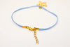 Ankle bracelet with a gold plated starfish dangle charm, blue cord - shani-adi-jewerly