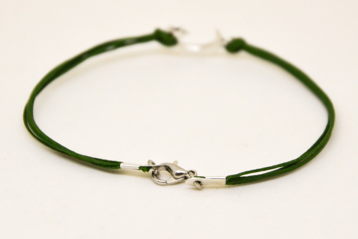 Men's bracelet with silver crescent moon charm, green cord - shani-adi-jewerly