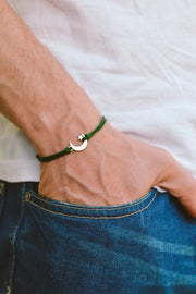 Men's bracelet with silver crescent moon charm, green cord - shani-adi-jewerly
