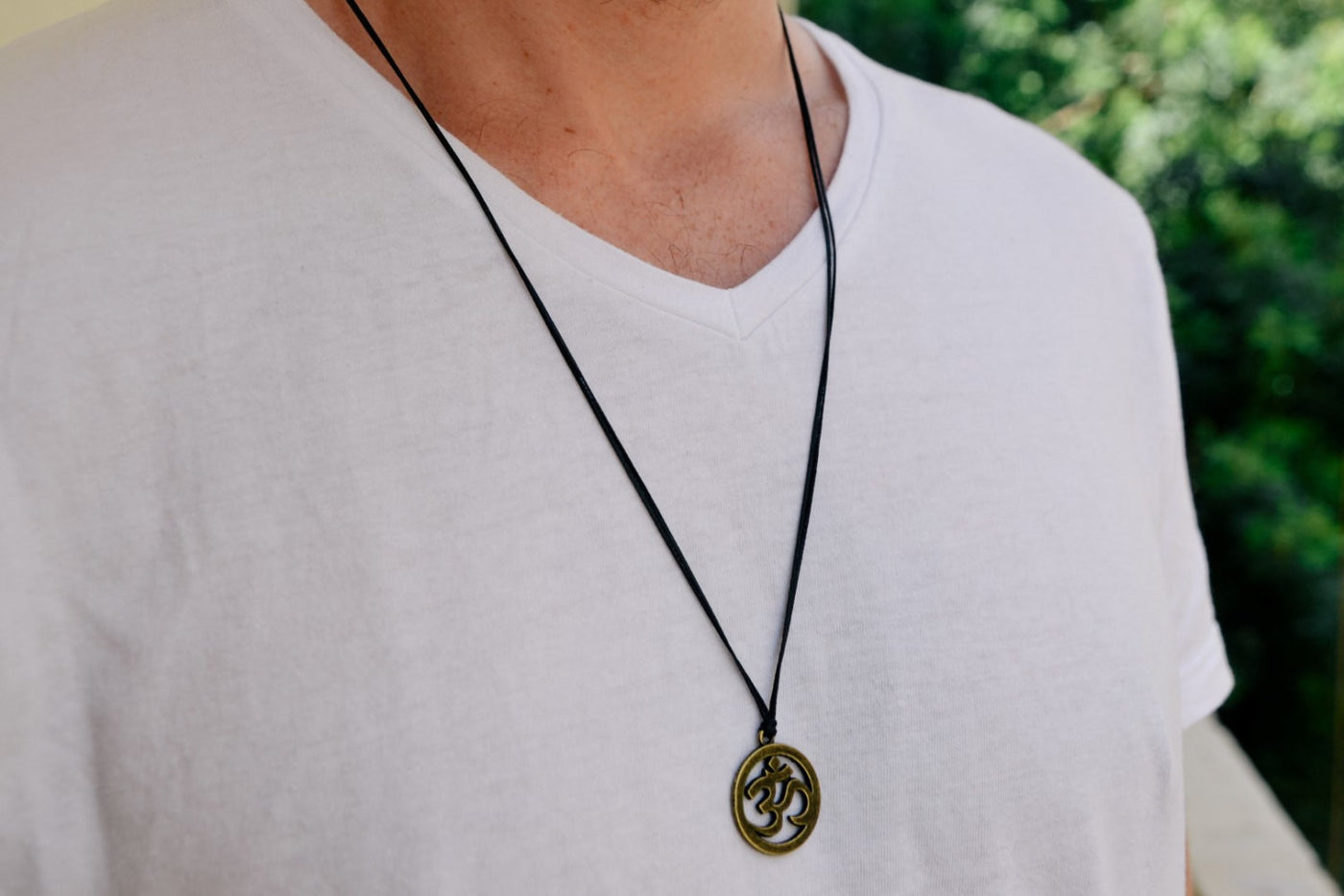 Men's necklace with a black cord and a bronze ohm pendant, Om necklace for  men, groomsmen gift for him, men's jewelry, yoga jewelry, hindu – Shani &  Adi Jewelry