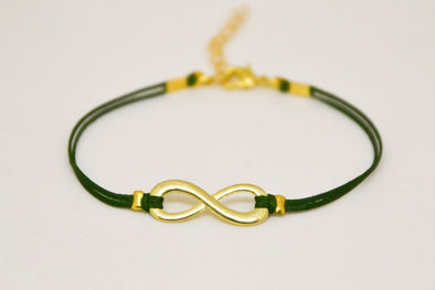 Green cord bracelet with a gold tone infinity charm - shani-adi-jewerly