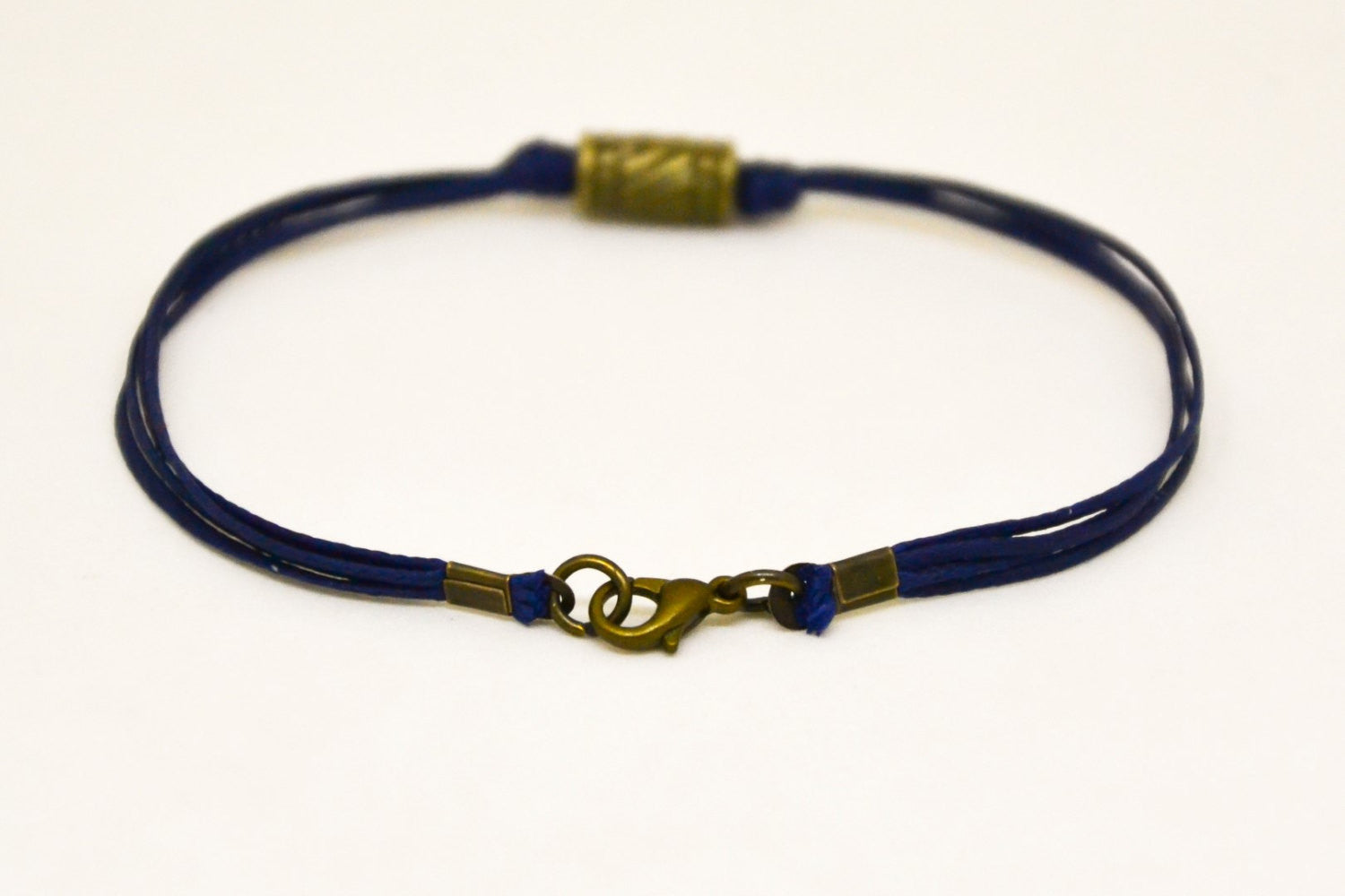 Men's bracelet with bronze tube charm, blue cord - shani-adi-jewerly