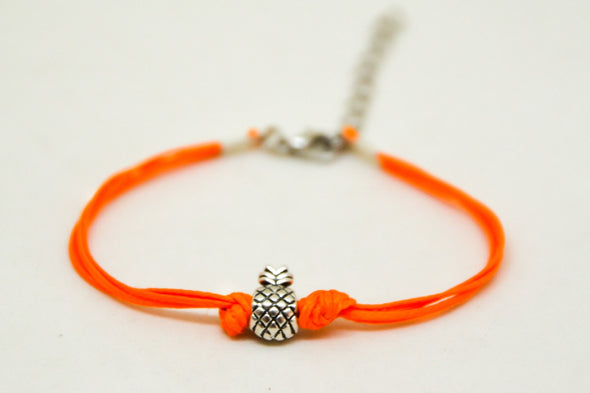 Orange cord bracelet with a silver pineapple charm - shani-adi-jewerly