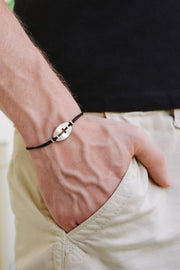 Silver cross bracelet for men, black cord - shani-adi-jewerly