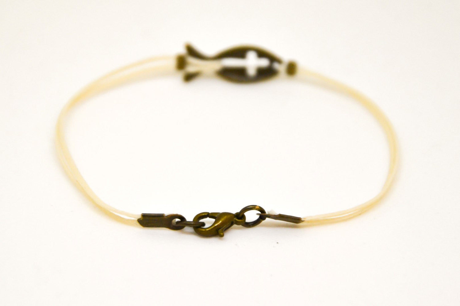 Bronze cross fish bracelet for men, beige cord - shani-adi-jewerly
