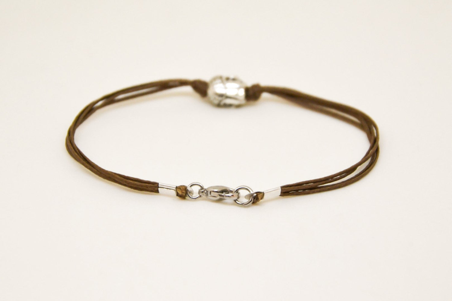Men's bracelet with silver buddha charm, brown cord - shani-adi-jewerly