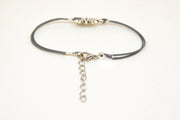 Women bracelet with silver snow flake charm, gray cord - shani-adi-jewerly