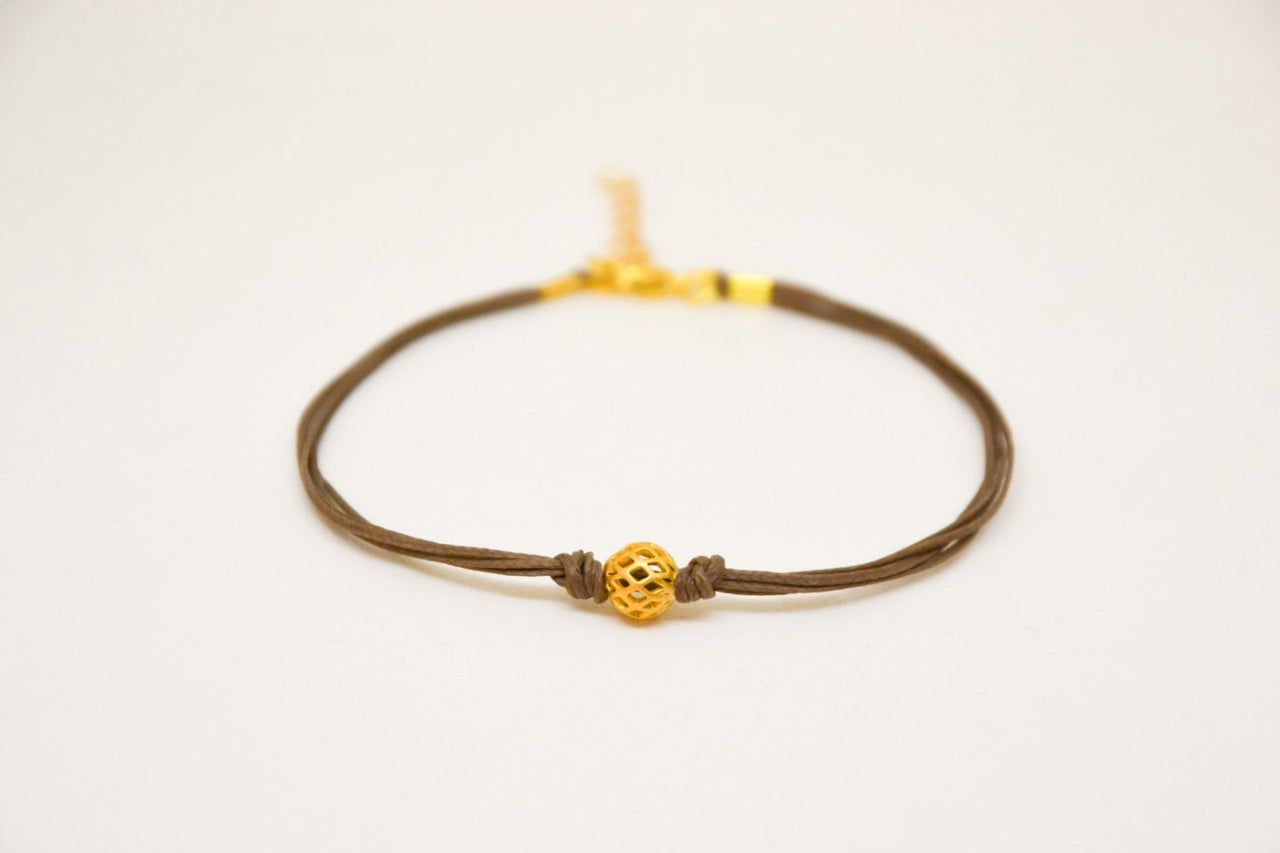 Brown ankle bracelet with matt gold ball bead charm - shani-adi-jewerly