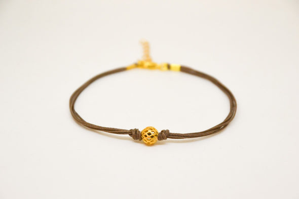 Brown ankle bracelet with matt gold ball bead charm - shani-adi-jewerly