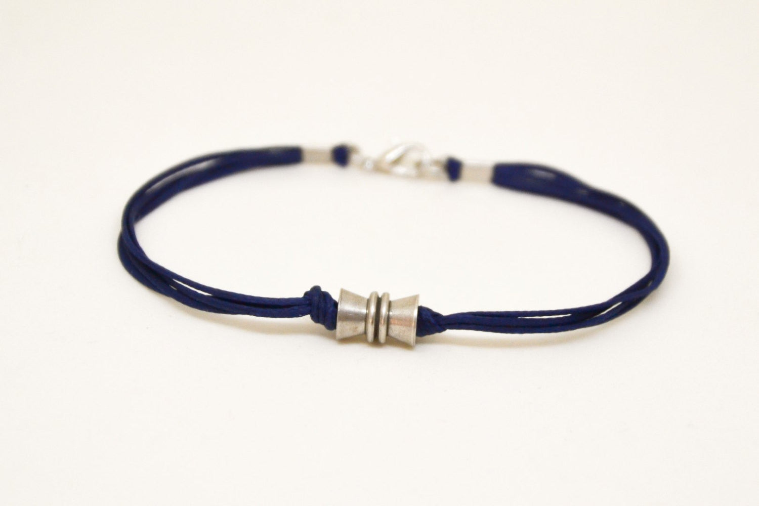 Men's bracelet with a silver tube charm and a blue cord - shani-adi-jewerly
