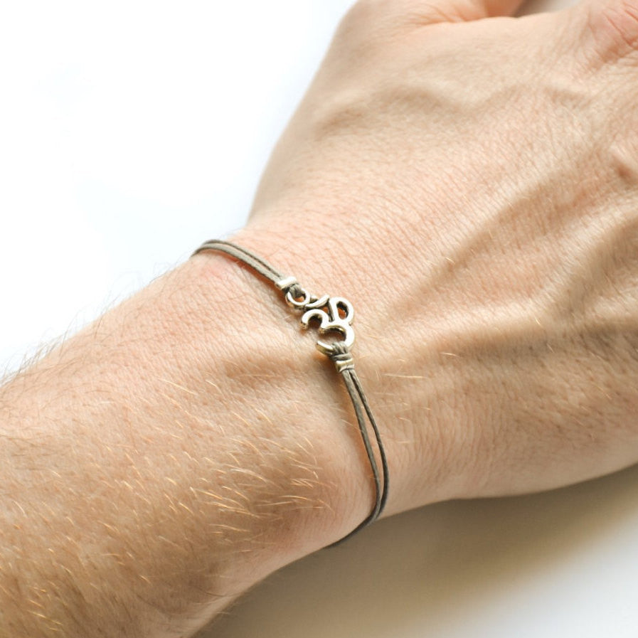 Shani & Adi Jewelry OM bracelet, wrapped bracelet with silver tone Om  India | Ubuy
