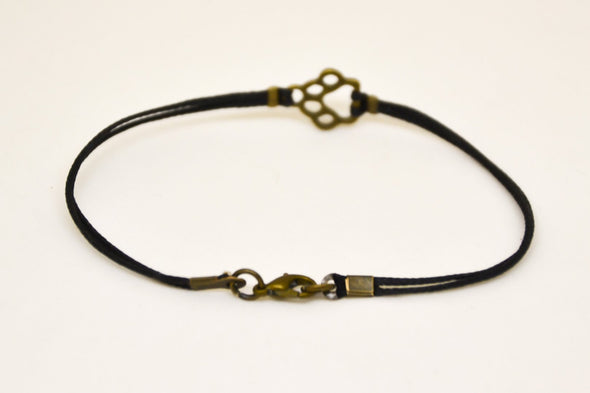 Bronze paw bracelet for men, black cord - shani-adi-jewerly