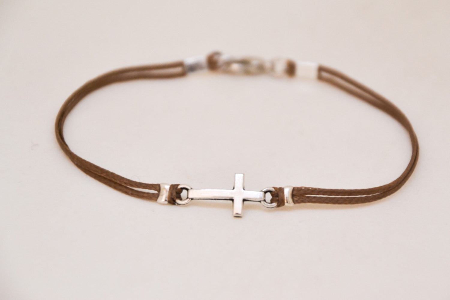 Men's bracelet with a silver cross pendant, brown cord - shani-adi-jewerly