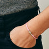 Women bracelet with silver cross charm, pink cord - shani-adi-jewerly