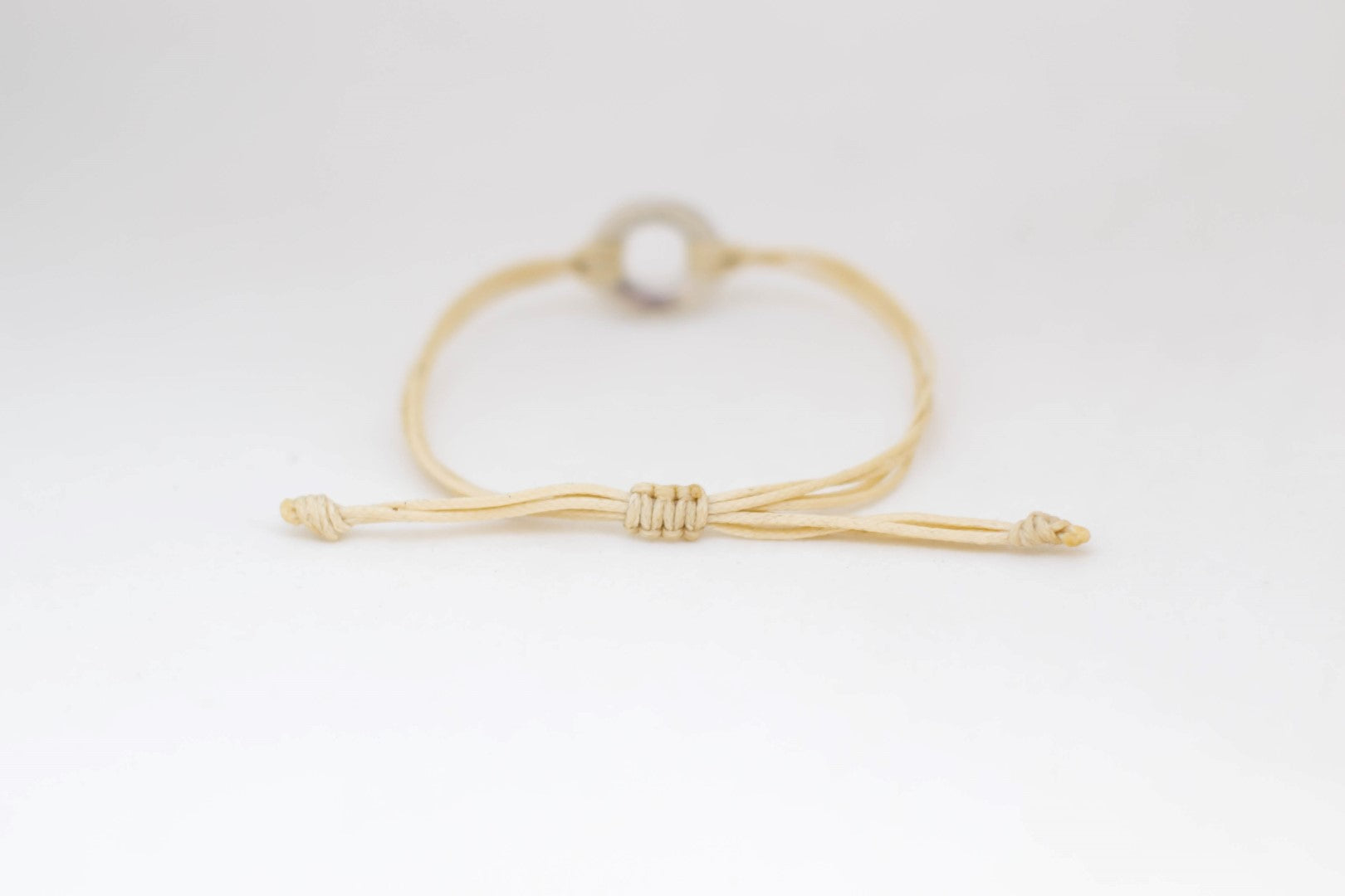 Adjustable silver karma circle bracelet for men, beige cord, yoga jewelry - shani-adi-jewerly