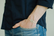 Adjustable silver karma circle bracelet for men, beige cord, yoga jewelry - shani-adi-jewerly