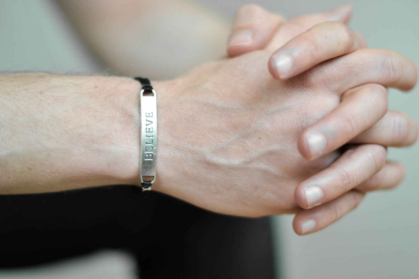 Silver believe charm bracelet for men, black cord, Christmas gift for him - shani-adi-jewerly