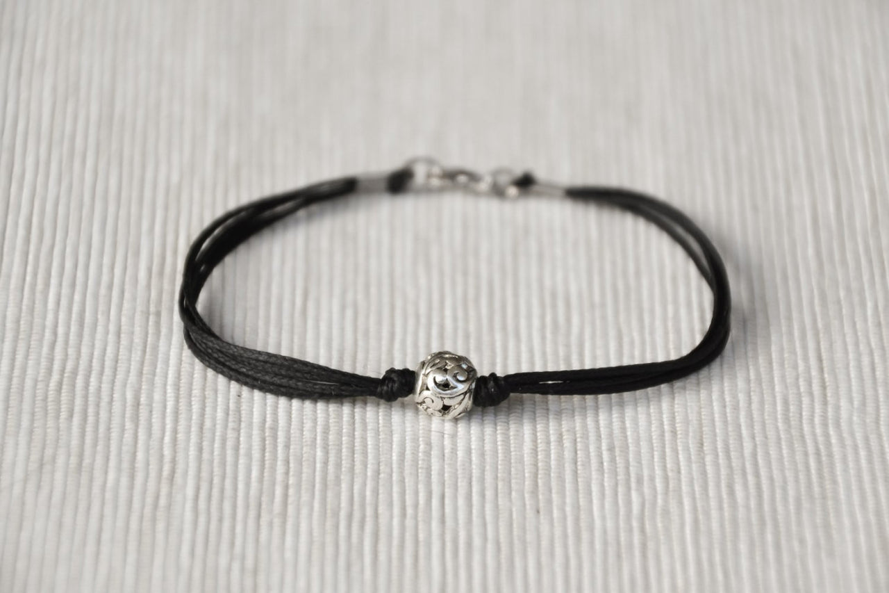 Men's bracelet with silver bead charm and a black cord - shani-adi-jewerly