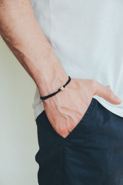 Men's bracelet with silver bead charm and a black cord - shani-adi-jewerly