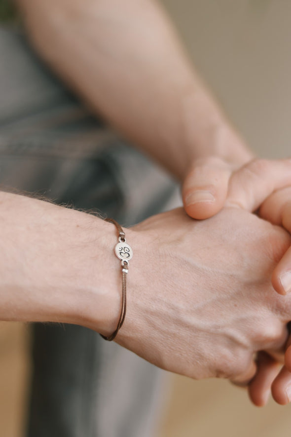 Silver Om charm bracelet for men, brown cord, personalised custom color and size, yoga bracelet