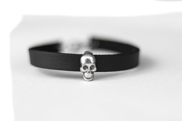 Skull bracelet for men with a black faux leather cuff strap, custom size