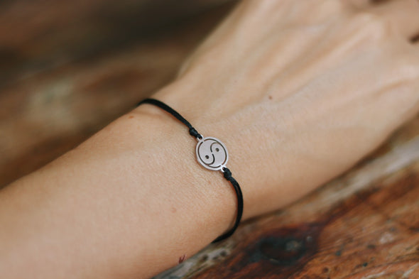 handmade silver yin and yang bracelet for women, black cord - shani and adi jewelry